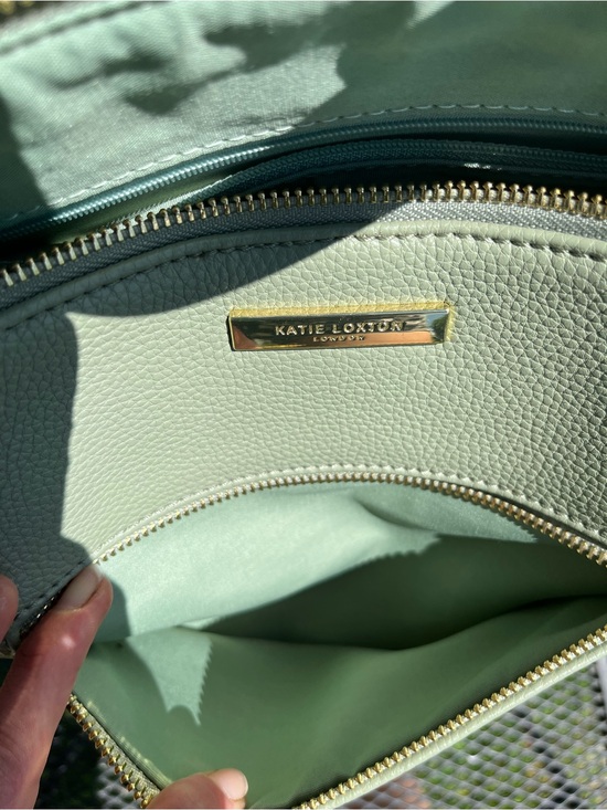 Mint Green Pebbled Leather Backpack with Gold Accents